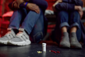 2 drug addicts on the floor suffering from addiction