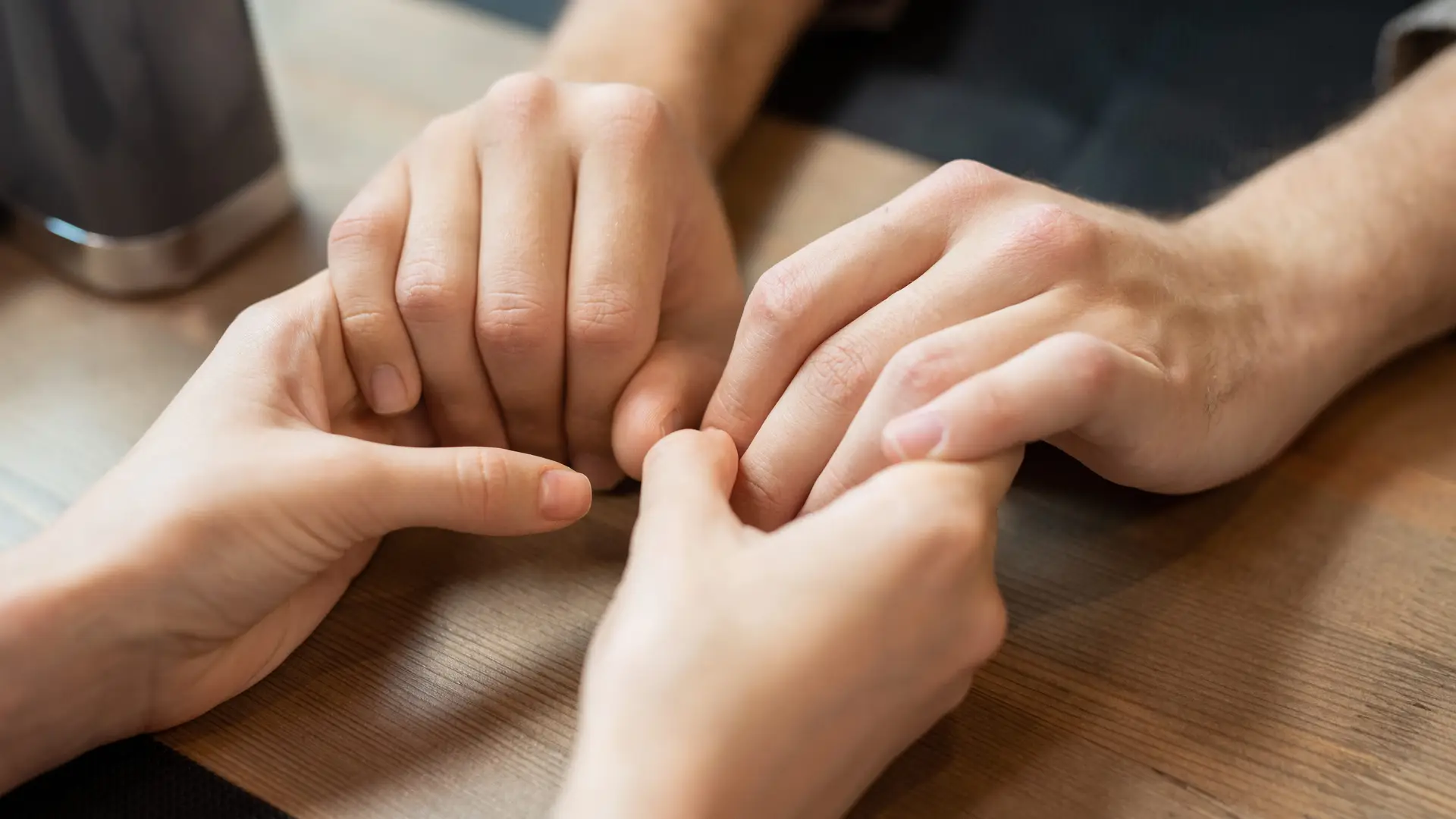 mending relationships, hand holding